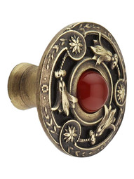 Jeweled Lily Cabinet Knob Inset with Red Carnelian - 1 1/4 inch Diameter in Antique Brass.